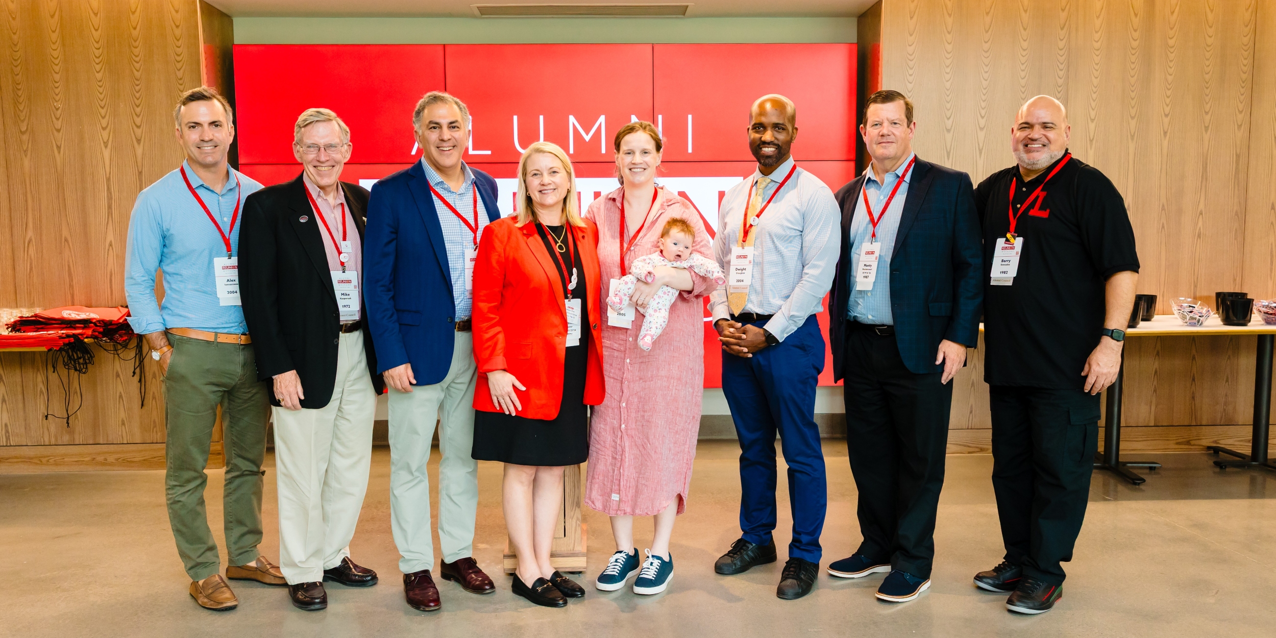 Members of the Alumni Council for 2025-26 stand in a row.